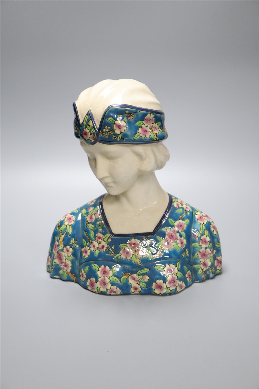 A French Art Nouveau style portrait bust, lady wearing head-dress, 26cm